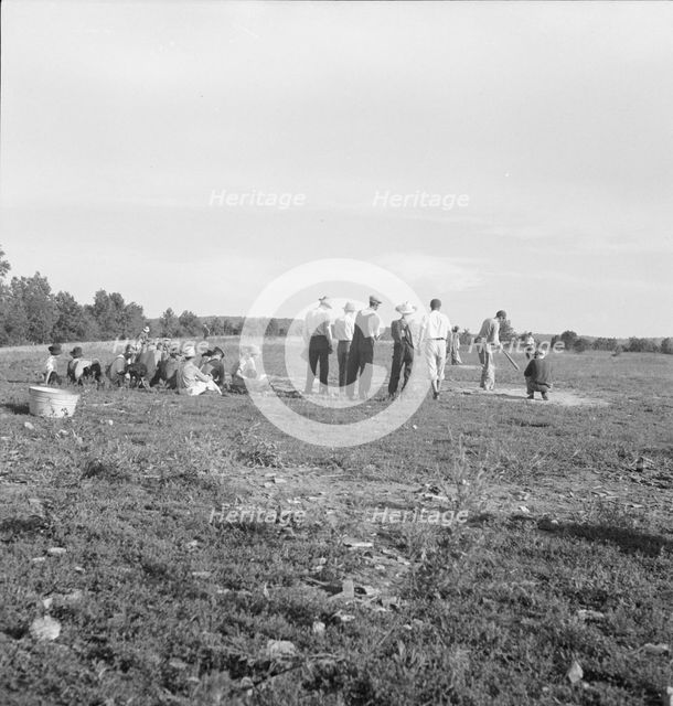 Farmers' baseball game in the country, on U.S. 62, near Mountain Home, northern Arkansas, 1938. Creator: Dorothea Lange.