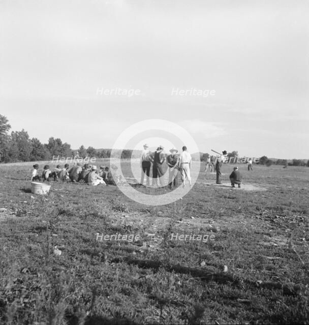 Farmers' baseball game in the country, on U.S. 62, near Mountain Home, northern Arkansas, 1938. Creator: Dorothea Lange.