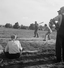 Farmers baseball game in the country, on U.S. 62, near Mountain Home, northern Arkansas, 1938. Creator: Dorothea Lange