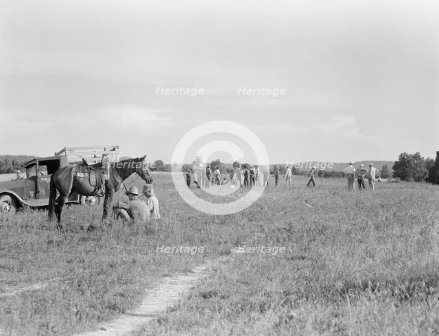 Farmers' baseball game in the country, on U.S. 62, near Mountain Home, northern Arkansas, 1938. Creator: Dorothea Lange.