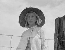 Farmer's daughter in the fields, farm in Georgia, 1937. Creator: Dorothea Lange