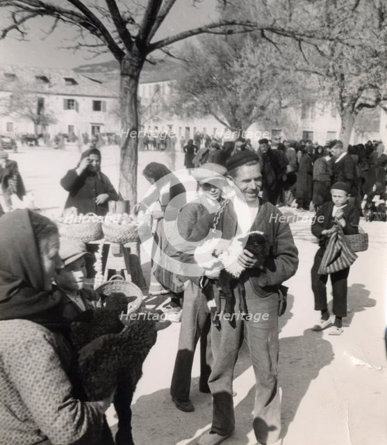 Farmers from Zenica at the market, Bosnia-Hercegovina, Yugoslavia, 1939. Creator: Unknown.
