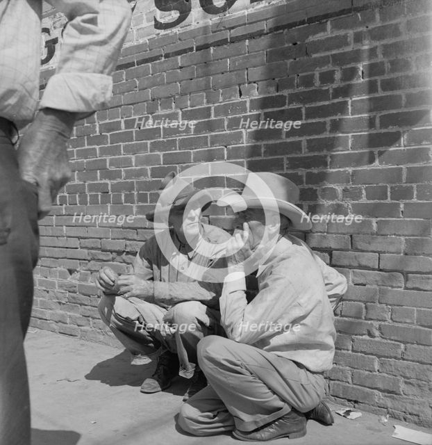 Farmers on street corner, Odessa, Texas, 1937. Creator: Dorothea Lange.