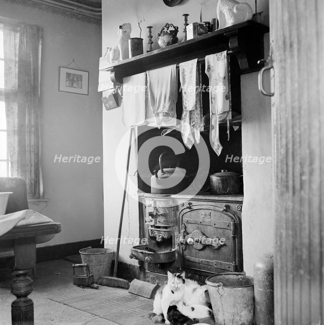 Farmhouse kitchen, Gwendreath, The Lizard, Cornwall, c1950-c1965. Artist: John Gay.