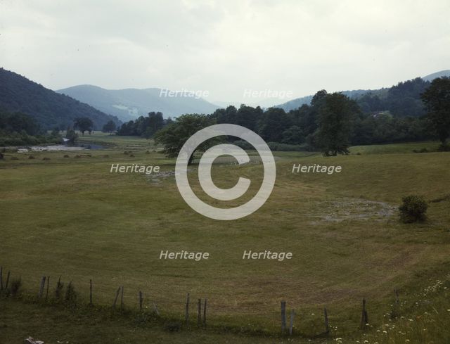 Farmland along the upper Delaware River in New York state, 1943. Creator: John Collier.