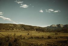 Farmland in the vicinity of Mt. Sneffels, Ouray County, Colorado, 1940. Creator: Russell Lee