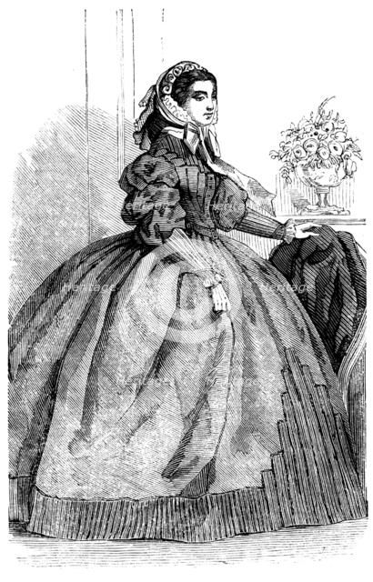 Fashions for November - Dress of Silver-Grey Silk, 1858. Creator: Unknown.