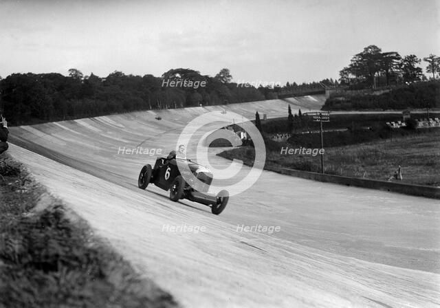 FE Elgood driving a Bentley at the MCC Members Meeting, Brooklands, 10 September 1938. Artist: Bill Brunell.