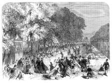 Fete given by the Prince Imperial to poor children of Paris in the Tuileries Gardens, 1864. Creator: Unknown