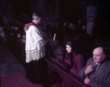 Feast of St Blaise, Benediction of the Throat, ancient custom, London, c1955. Creator: Arthur Charles Kirby Ware