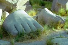 Feet from a colossal statue, Karnak, Egypt. Creator: Tony Evans