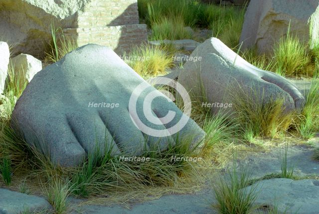 Feet from a colossal statue, Karnak, Egypt. Creator: Tony Evans.