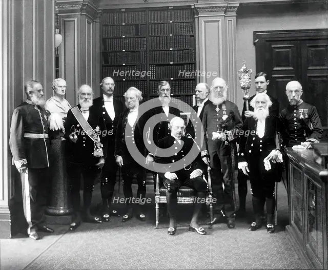 Fellows of the Royal Society: Sir John Evans, bust of Sir Isaac Newton, Lord Kelvin, RB Clifton... Creator: Mayall.
