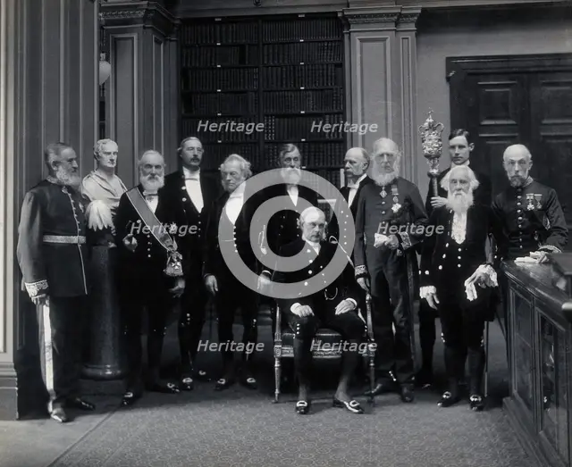 Fellows of the Royal Society: Sir John Evans, bust of Sir Isaac Newton, Lord Kelvin, RB Clifton... Creator: Mayall.