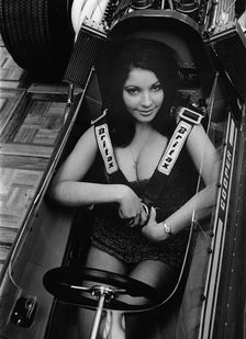 Female model in cockpit of Cooper F5000 at 1969 Racing Car show. Creator: Unknown