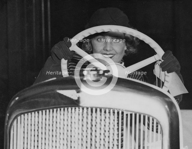 Female model in Hillman Minx at 1933 Motor Show. Creator: Unknown.