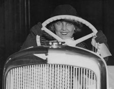 Female model in Hillman Minx at 1933 Motor Show. Creator: Unknown