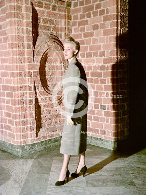 Female model shows a suit, the Historical Museum, Stockholm, 1950s. Creator: Göran Algård.