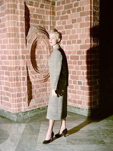 Female model shows a suit, the Historical Museum, Stockholm, 1950s. Creator: Göran Algård