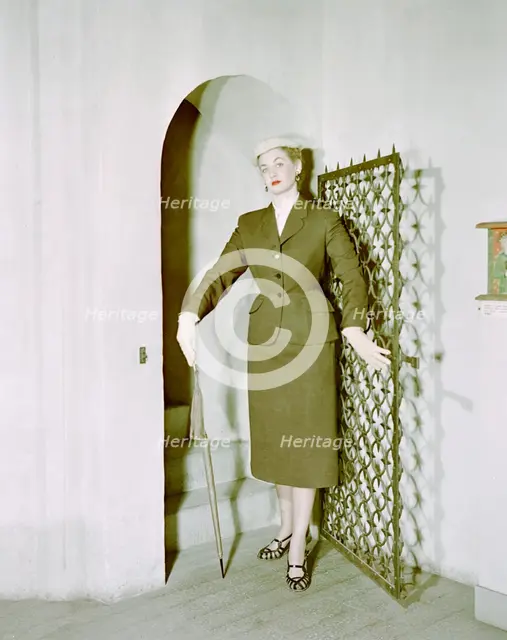 Female model shows a suit, the Historical Museum, Stockholm, 1950s. Creator: Göran Algård.