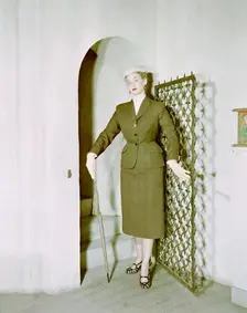 Female model shows a suit, the Historical Museum, Stockholm, 1950s. Creator: Göran Algård