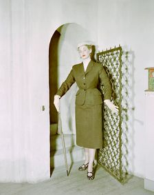 Female model shows a suit, the Historical Museum, Stockholm, 1950s. Creator: Göran Algård