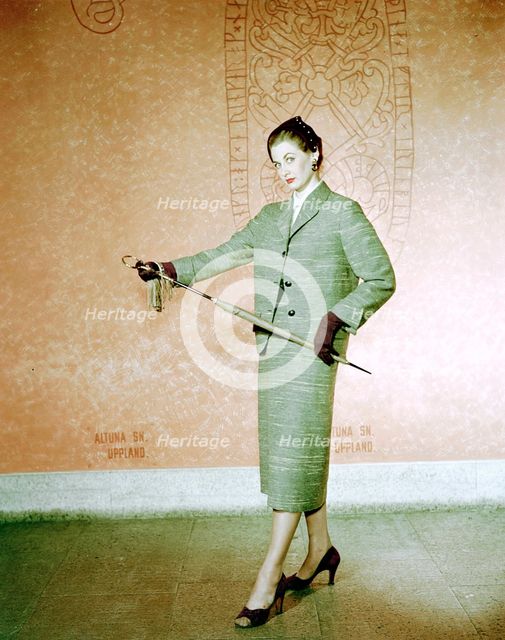 Female model shows a suit, the Historical Museum, Stockholm, 1950s. Creator: Göran Algård.