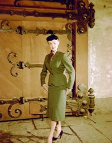 Female model shows a suit, the Historical Museum, Stockholm, 1950s. Creator: Göran Algård