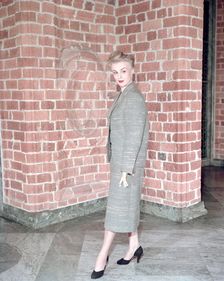 Female model shows a suit, the Historical Museum, Stockholm, 1950s. Creator: Göran Algård
