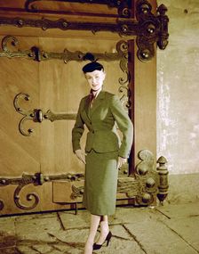 Female model shows a suit, the Historical Museum, Stockholm, 1950s. Artist: Göran Algård