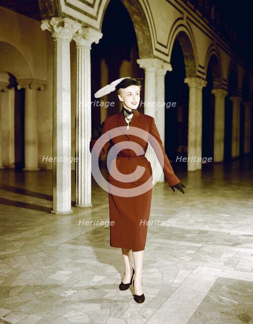 Female model shows a suit, the Historical Museum, Stockholm, 1950s. Artist: Göran Algård