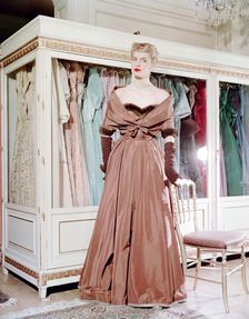 Female model shows an evening dress, Stockholm, 1950s. Creator: Göran Algård