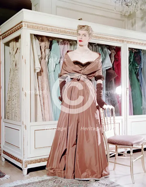 Female model shows an evening dress, Stockholm, 1950s. Creator: Göran Algård.