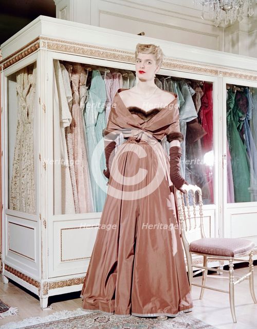 Female model shows an evening dress, Stockholm, 1950s. Creator: Göran Algård.