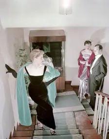Female model shows an evening dress, Stockholm, 1950s. Creator: Göran Algård