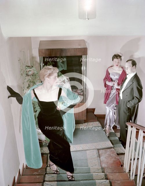 Female model shows an evening dress, Stockholm, 1950s. Creator: Göran Algård.
