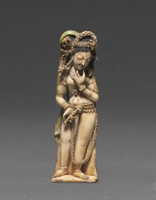 Female Attendant Bearing a Lotus , 8th Century. Creator: Unknown