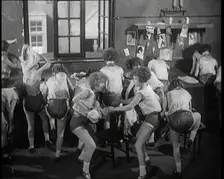 Female Actors Rapidly Changing Costumes For the Next Scene Backstage at the Theatre, 1920s. Creator: British Pathe Ltd