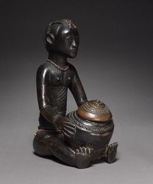 Female Bowl-Bearing Figure, late 1800s-early 1900s. Creator: Unknown