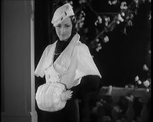 Female Civilian Modelling the Latest Fashions in a Fashion Show, 1931. Creator: British Pathe Ltd