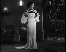 Female Civilian Modelling the Latest Fashions in a Fashion Show, 1931. Creator: British Pathe Ltd