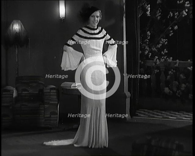 Female Civilian Modelling the Latest Fashions in a Fashion Show, 1931. Creator: British Pathe Ltd.