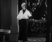 Female Civilian Modelling the Latest Fashions in a Fashion Show, 1931. Creator: British Pathe Ltd