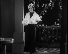 Female Civilian Modelling the Latest Fashions in a Fashion Show, 1931. Creator: British Pathe Ltd