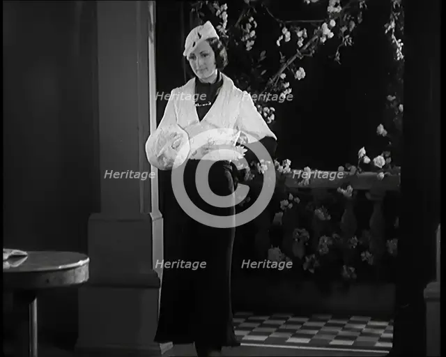 Female Civilian Modelling the Latest Fashions in a Fashion Show, 1931. Creator: British Pathe Ltd.
