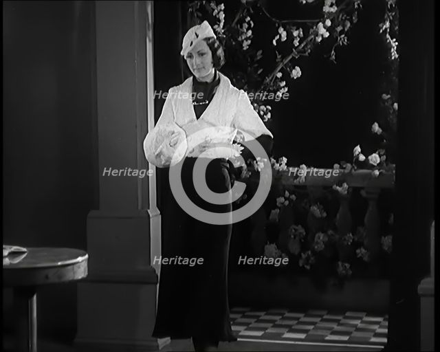 Female Civilian Modelling the Latest Fashions in a Fashion Show, 1931. Creator: British Pathe Ltd.