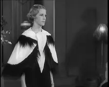 Female Civilian Modelling the Latest Fashions in a Fashion Show, 1931. Creator: British Pathe Ltd