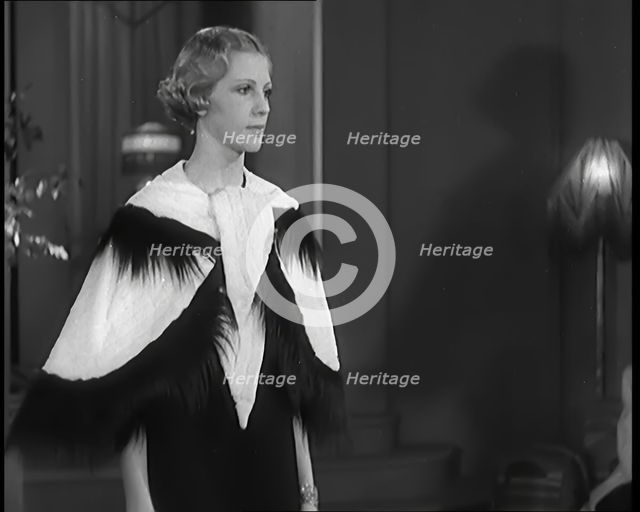 Female Civilian Modelling the Latest Fashions in a Fashion Show, 1931. Creator: British Pathe Ltd.