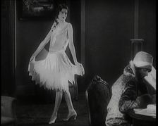 Female Civilian Modelling a Costume Designed for a Show, 1920s. Creator: British Pathe Ltd