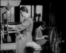 Female Civilian and Female Child Spinning and Weaving, 1931. Creator: British Pathe Ltd